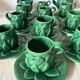 Antique slip cups with saucers, sugar bowl and milk pitcher