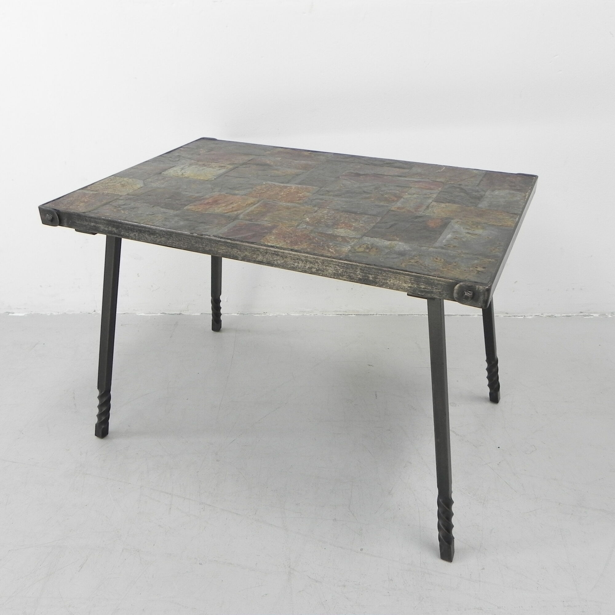 Brutalist coffee table with slate top