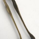 Sugar or ice cube tongs, gold star stamp with lion paw finish