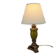 Vintage lamp with bronze imitation base & green relief glass in an antique style.