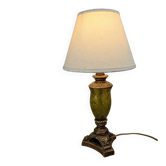 Vintage lamp with bronze imitation base & green relief glass in an antique style.