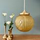 Suspension globe vintage art déco en verre dépoli jaune
