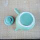 Old green ceramic kyusu teapot