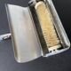 Vintage silver table crumb catcher with stainless steel handle
