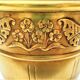 Vase in brass worked with flowers and butterflies around 1930