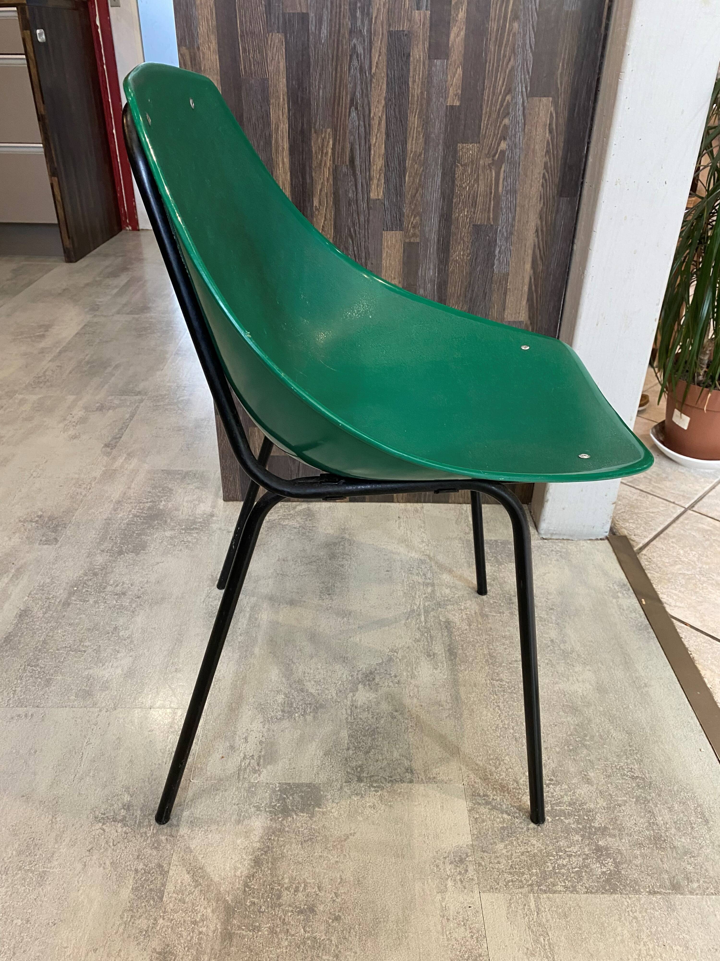 A shell chair by Pierre Guariche for Meurop in vintage green from the 1960s.