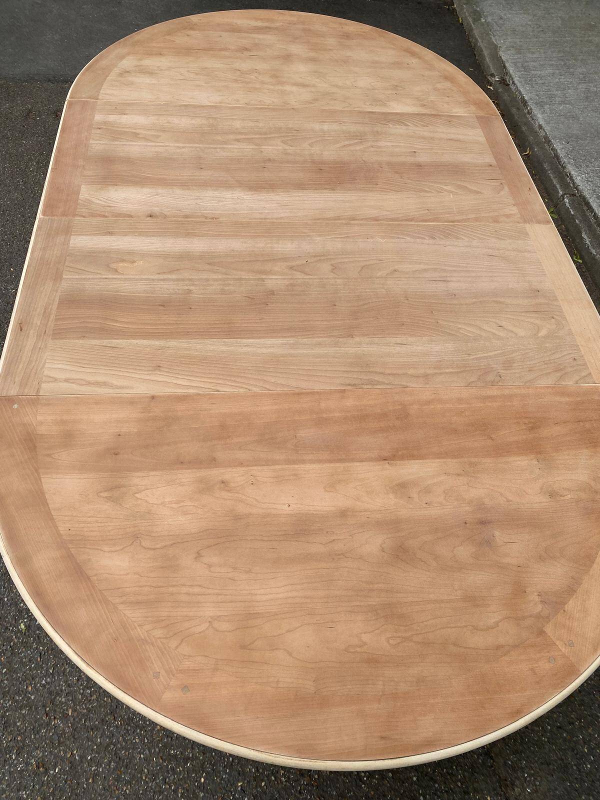 Renovated round extendable dining table with a central wooden leg, 113-203cm.