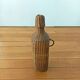 Bottle, old carafe in glass and wicker, 1950s