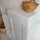 Old white asymmetrical chest of drawers