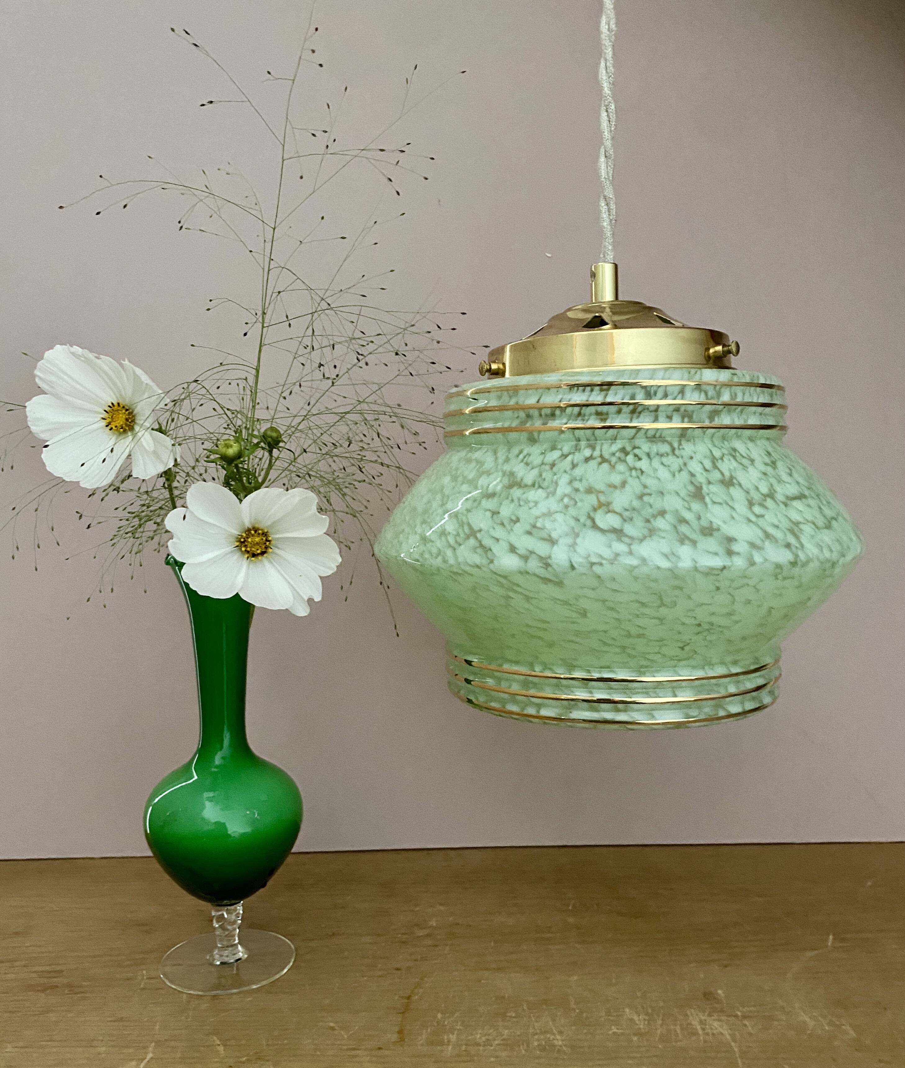 Art Deco globe pendant light in mint green and gold Clichy glass