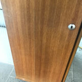 Scandinavian-style wooden cabinet with mirror