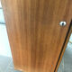 Scandinavian-style wooden cabinet with mirror