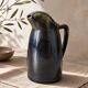 Flamed stoneware pitcher, signed