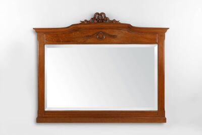 Miroir Art Déco en chêne à décors sculptés et miroir à facettes, années 1930