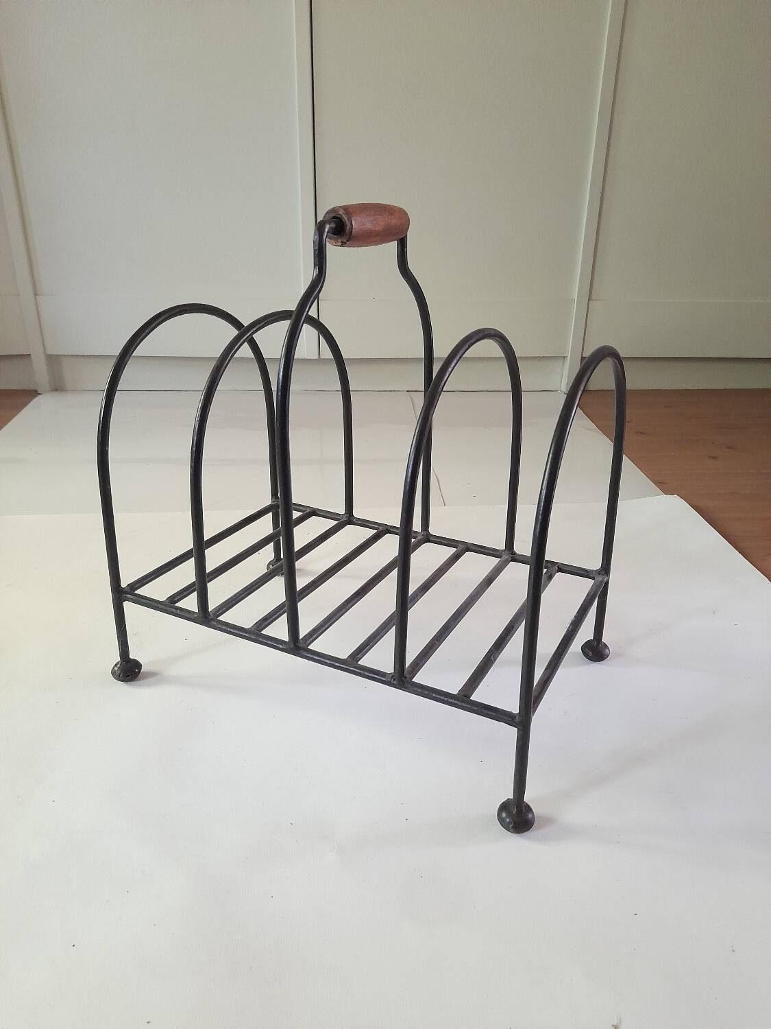 Vintage metal and wood magazine rack