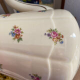 Old teapot or coffee maker in English style.