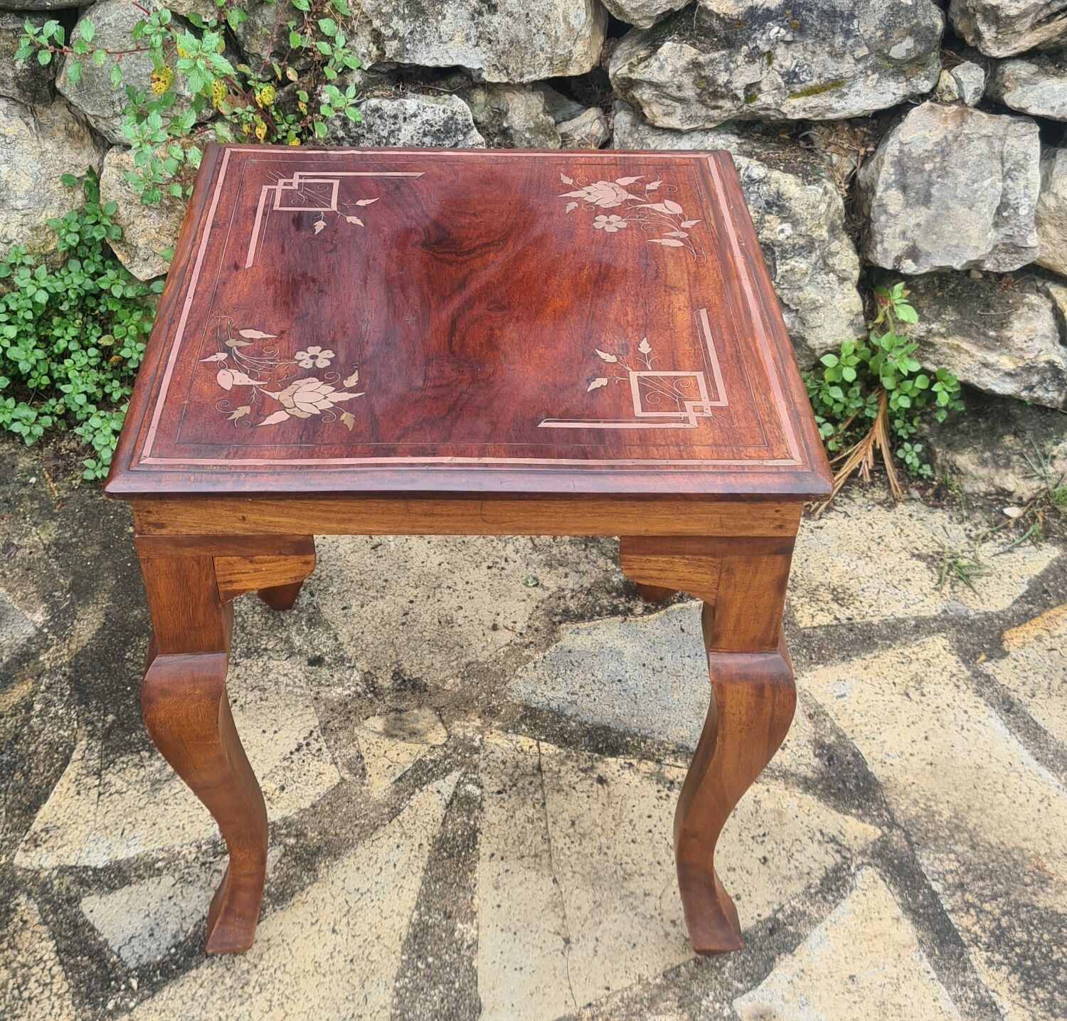 Coffee table in brass marquetry