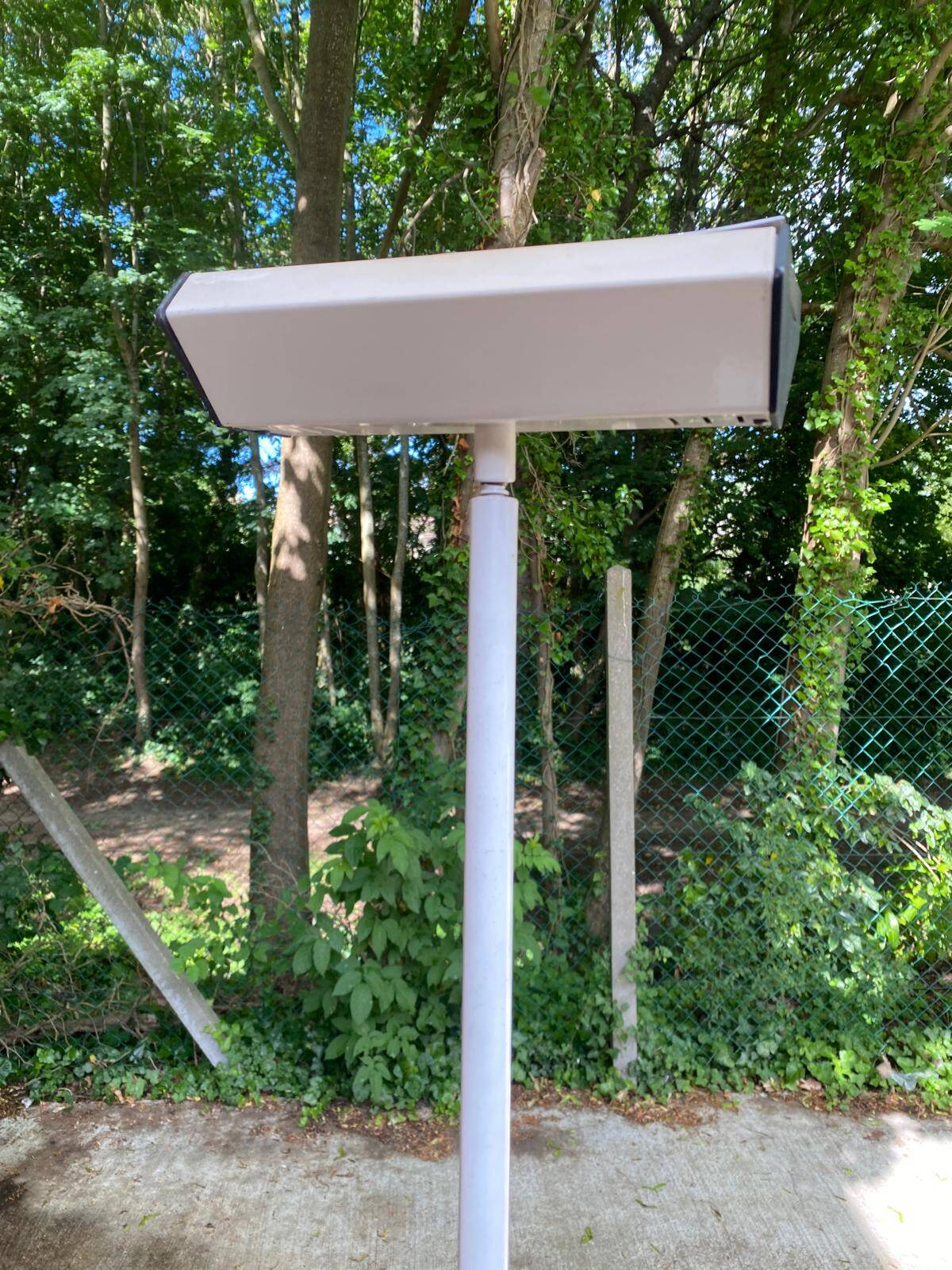 Vintage halogen floor lamp in white steel from the 1970s.