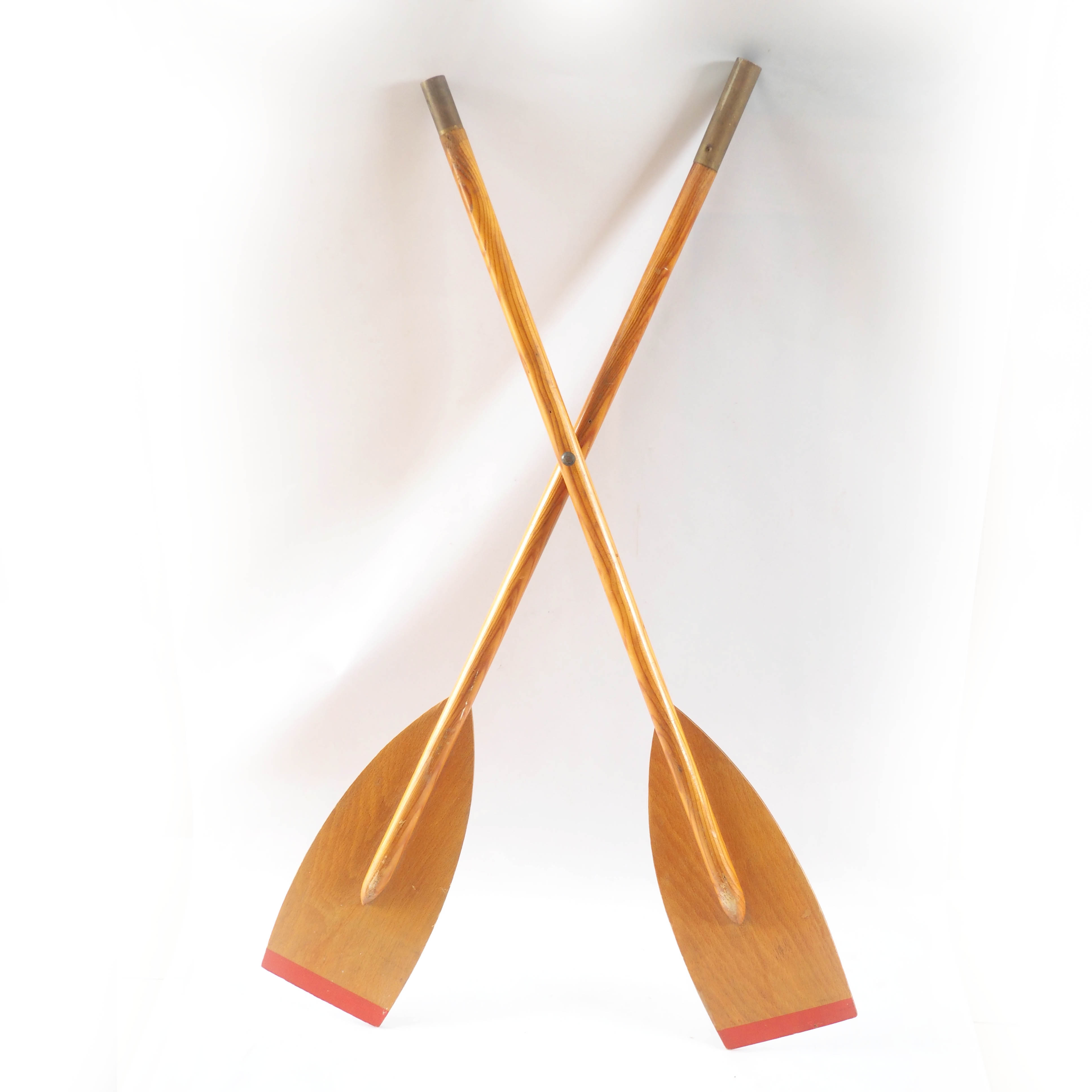 Pair of old wooden oars