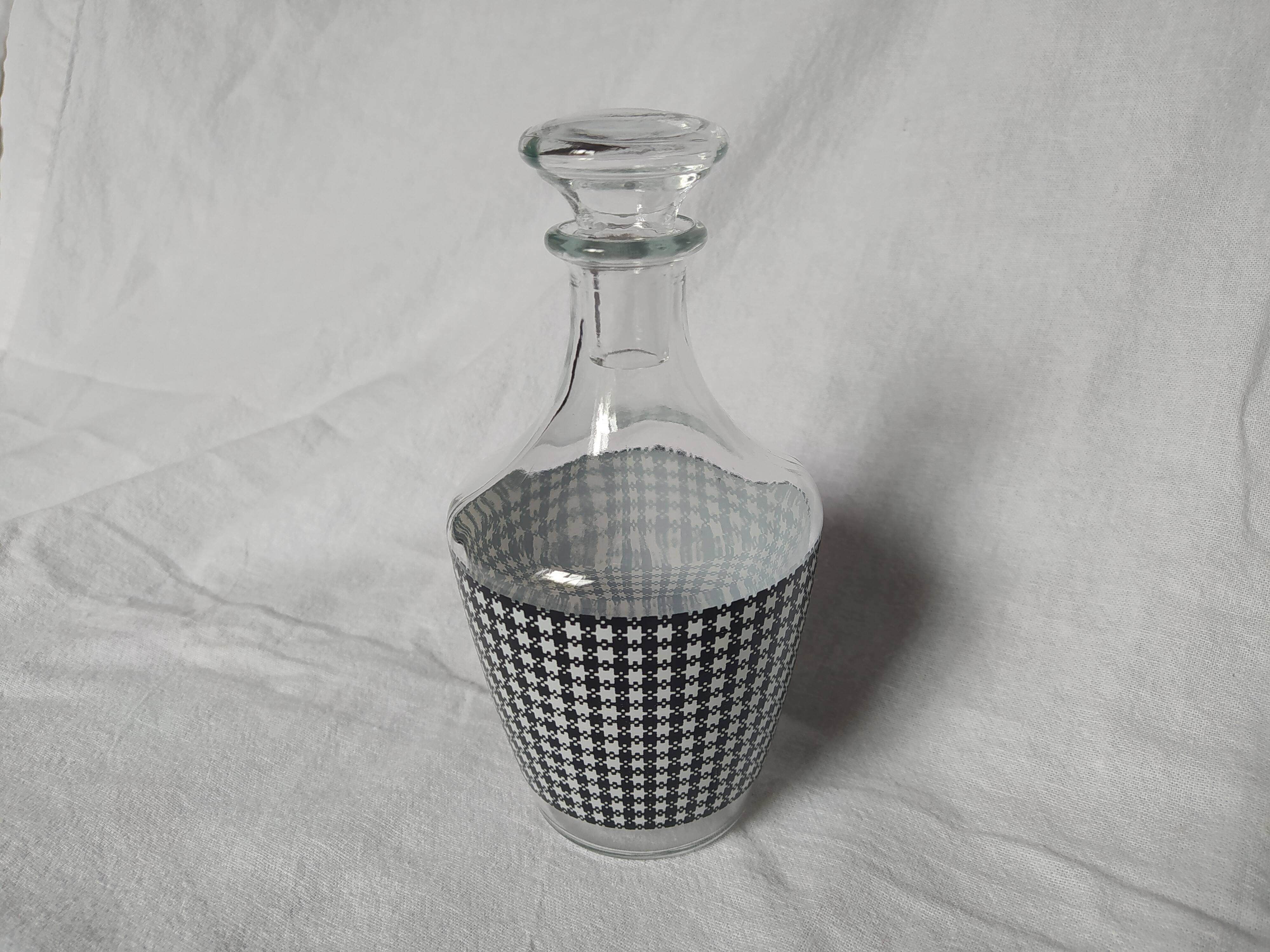Set of 2 black and white houndstooth glass carafes from the Arques crystal factory. Rare.