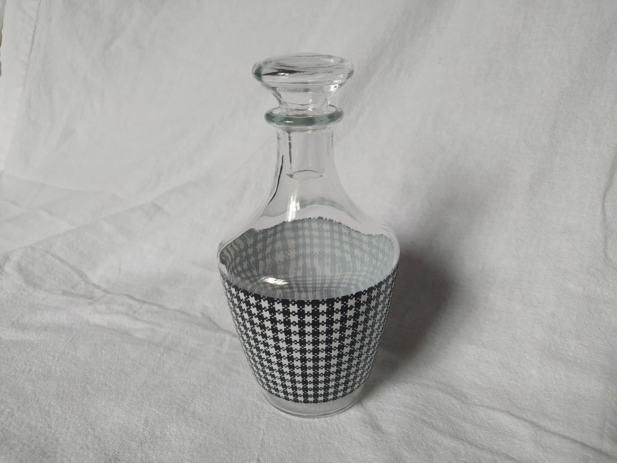 Set of 2 black and white houndstooth glass carafes from the Arques crystal factory. Rare.