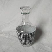 Set of 2 black and white houndstooth glass carafes from the Arques crystal factory. Rare.