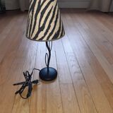 Lamp in metal with shade.