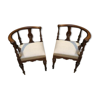 Paire de fauteuils de coin de style Louis XVI début 20ème