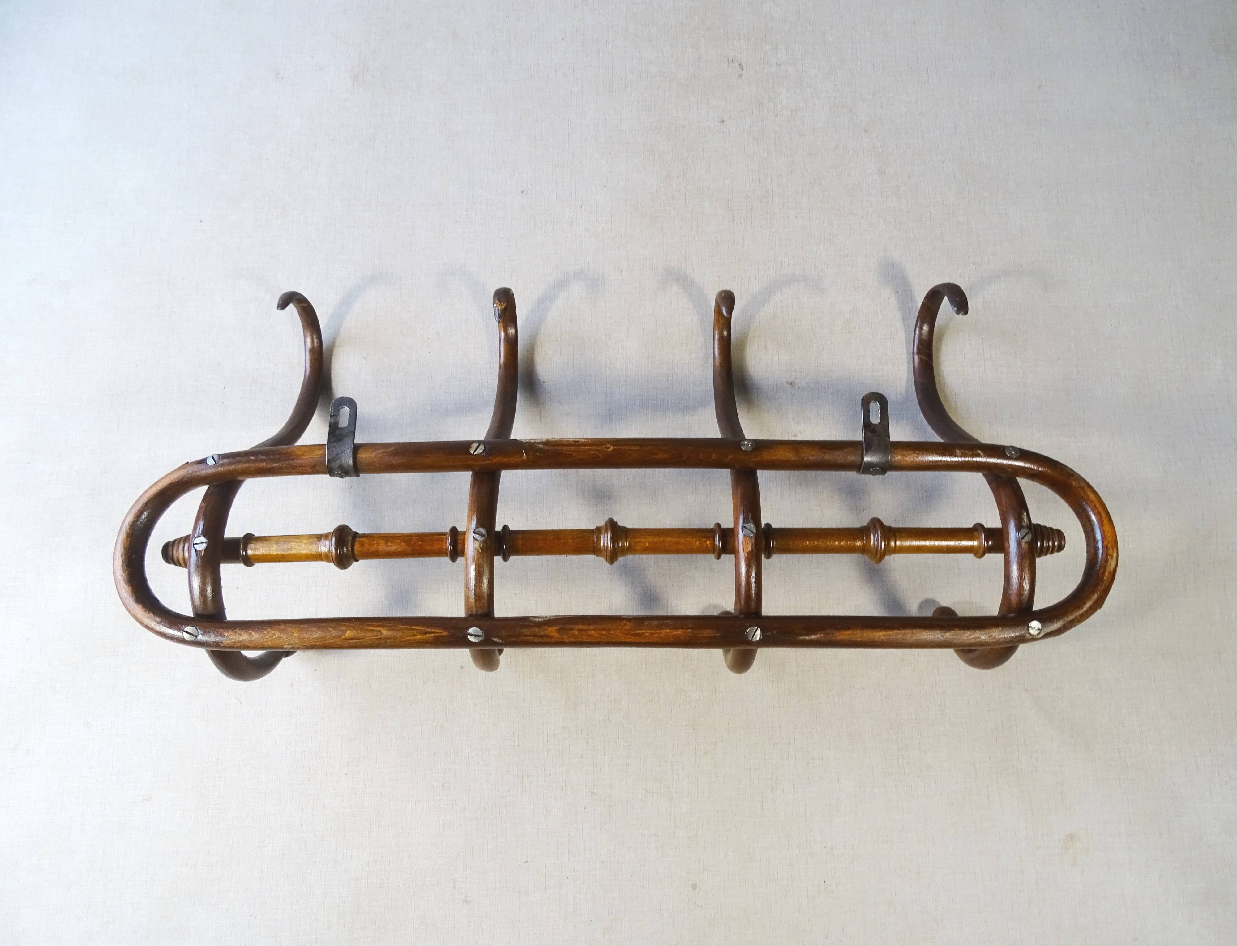 Wall coat rack by Kohn, bent wood 1910, no Thonet.