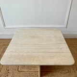 Square coffee table in travertine.