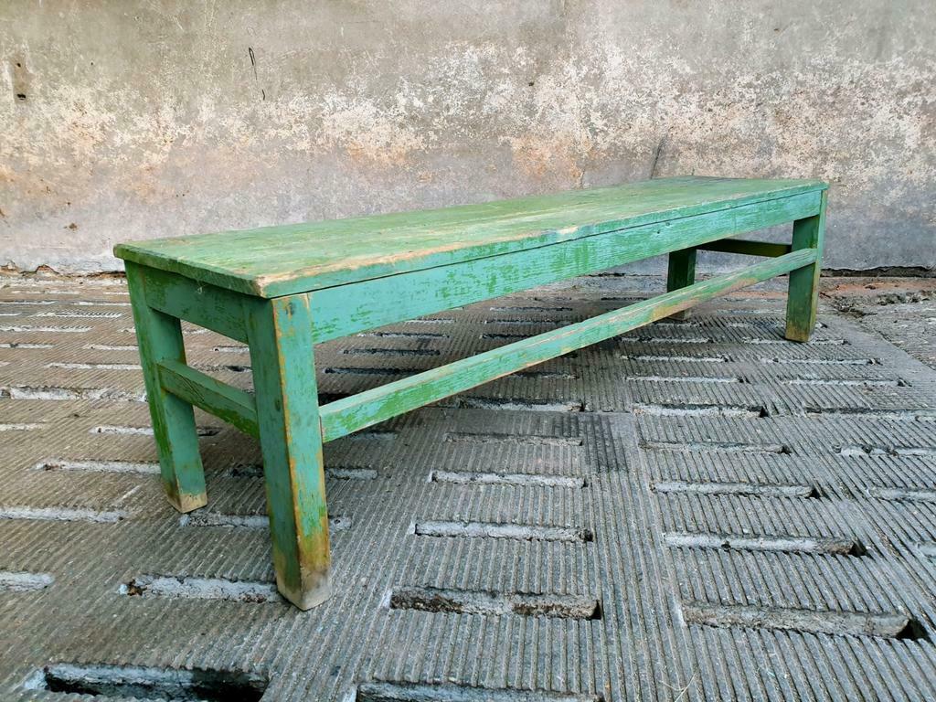 Old wooden bench sidetable green