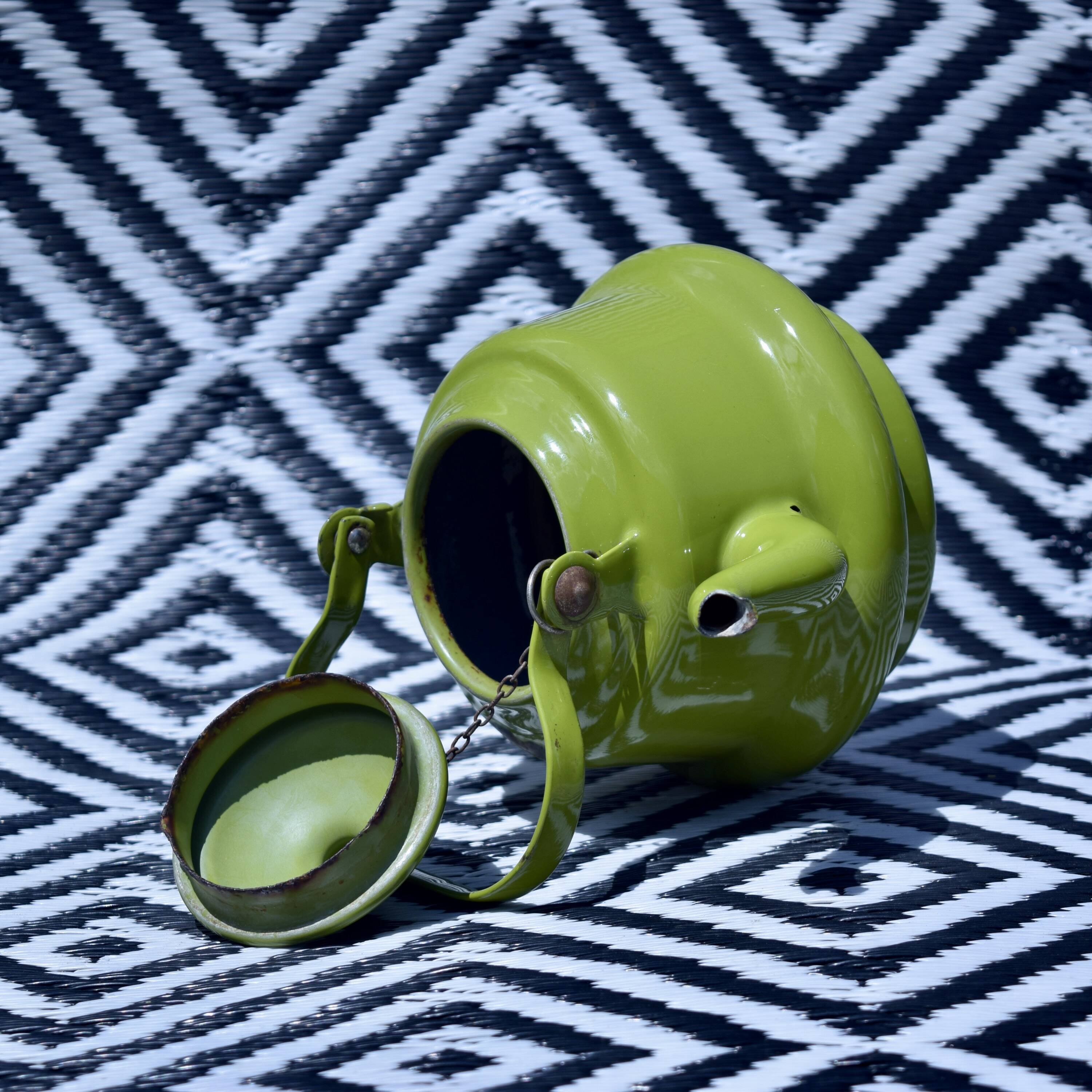 Vintage green enameled sheet metal kettle