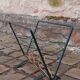 Wrought iron magazine rack from the 1950s