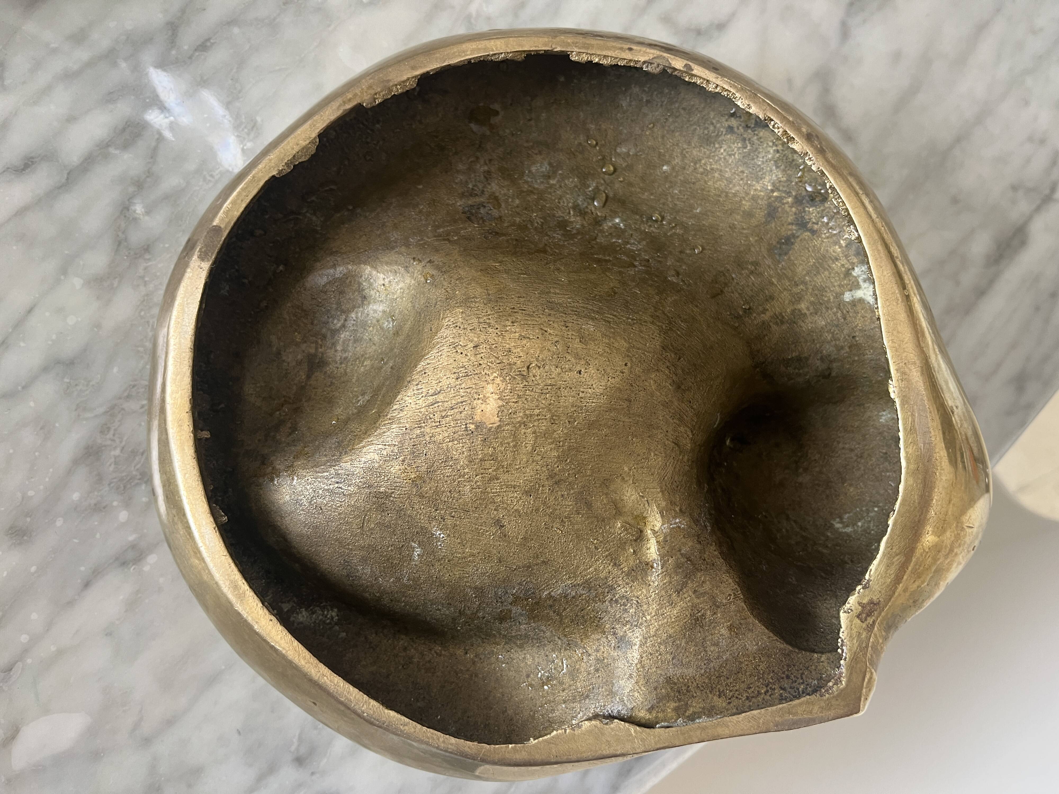 bronze cat emptier from the 1930s