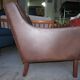Fauteuil en cuir et bois de rose, années 1960