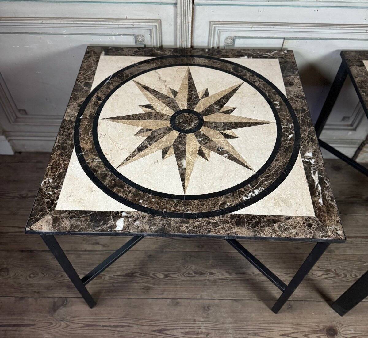 Pair of marble and metal tables, marble marquetry compass rose, circa 1990