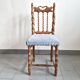 Chaise vintage en bois sculpté