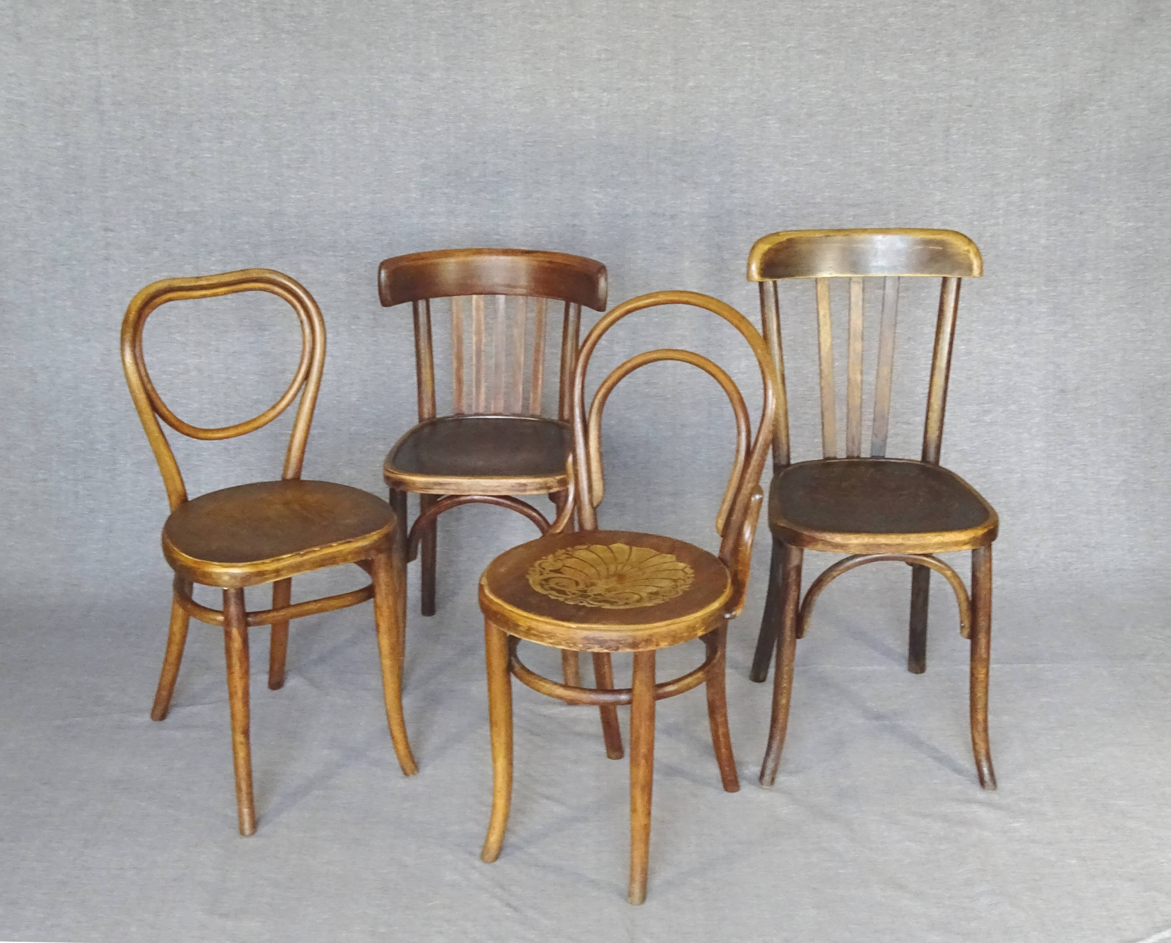 Set of 4 mismatched bistro chairs, from 1910 to 1935
