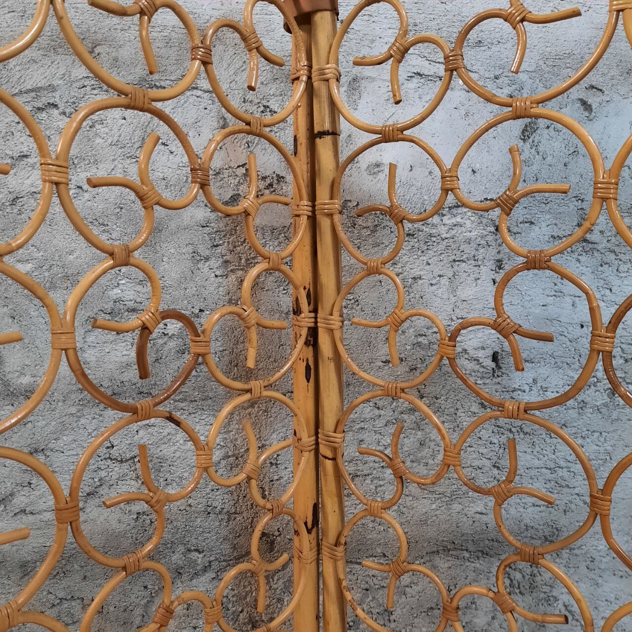 Vintage screen made of bamboo, wicker and leather