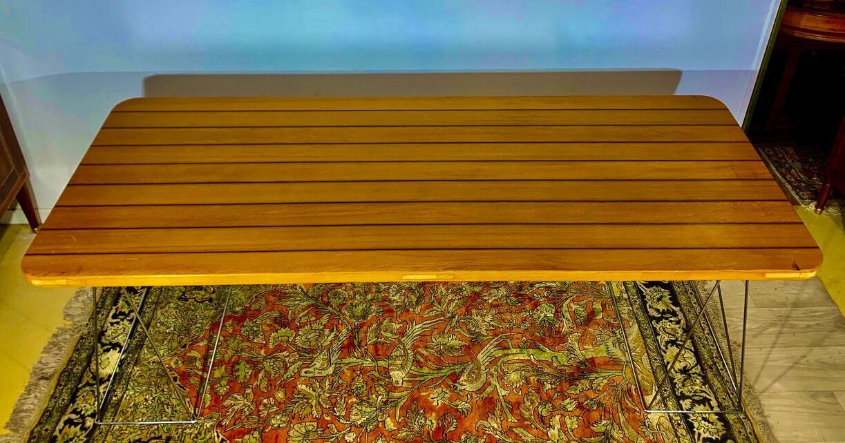 Teak table with chromed tubular metal base