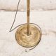 Standing metal lamp with glass shade