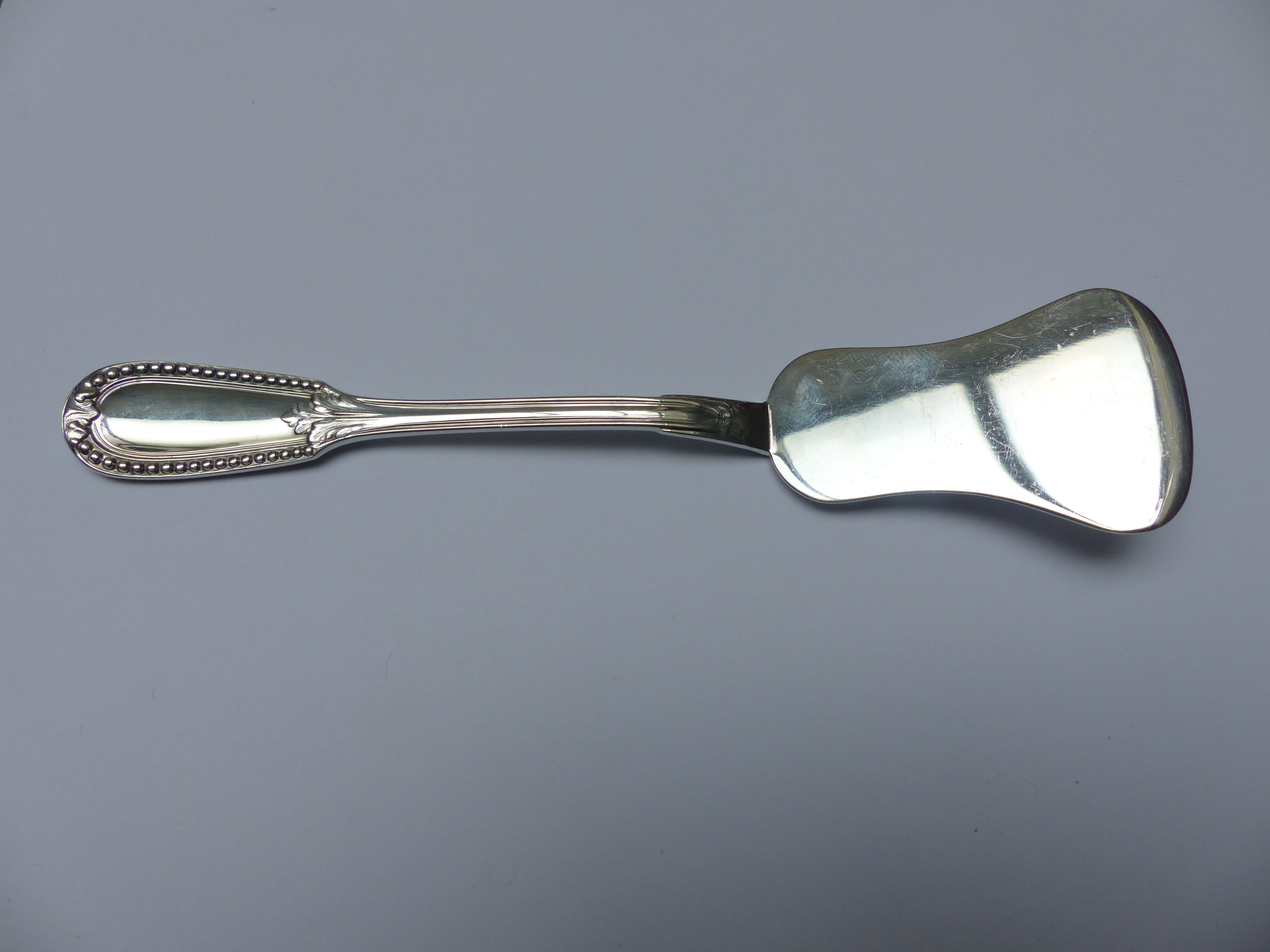 Antique silver mincing spoon