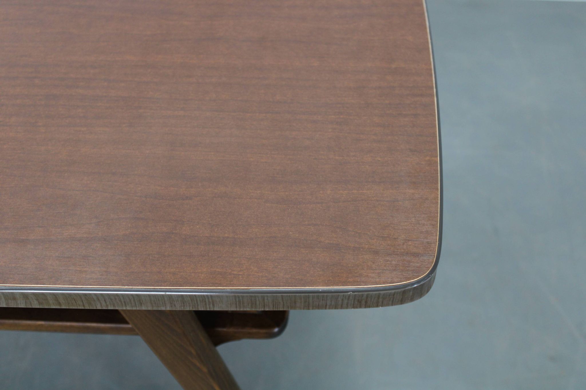 Mid-century German coffee table with rattan shelf and brass legs