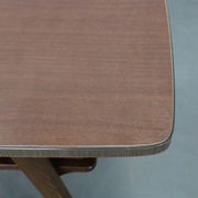 Mid-century German coffee table with rattan shelf and brass legs