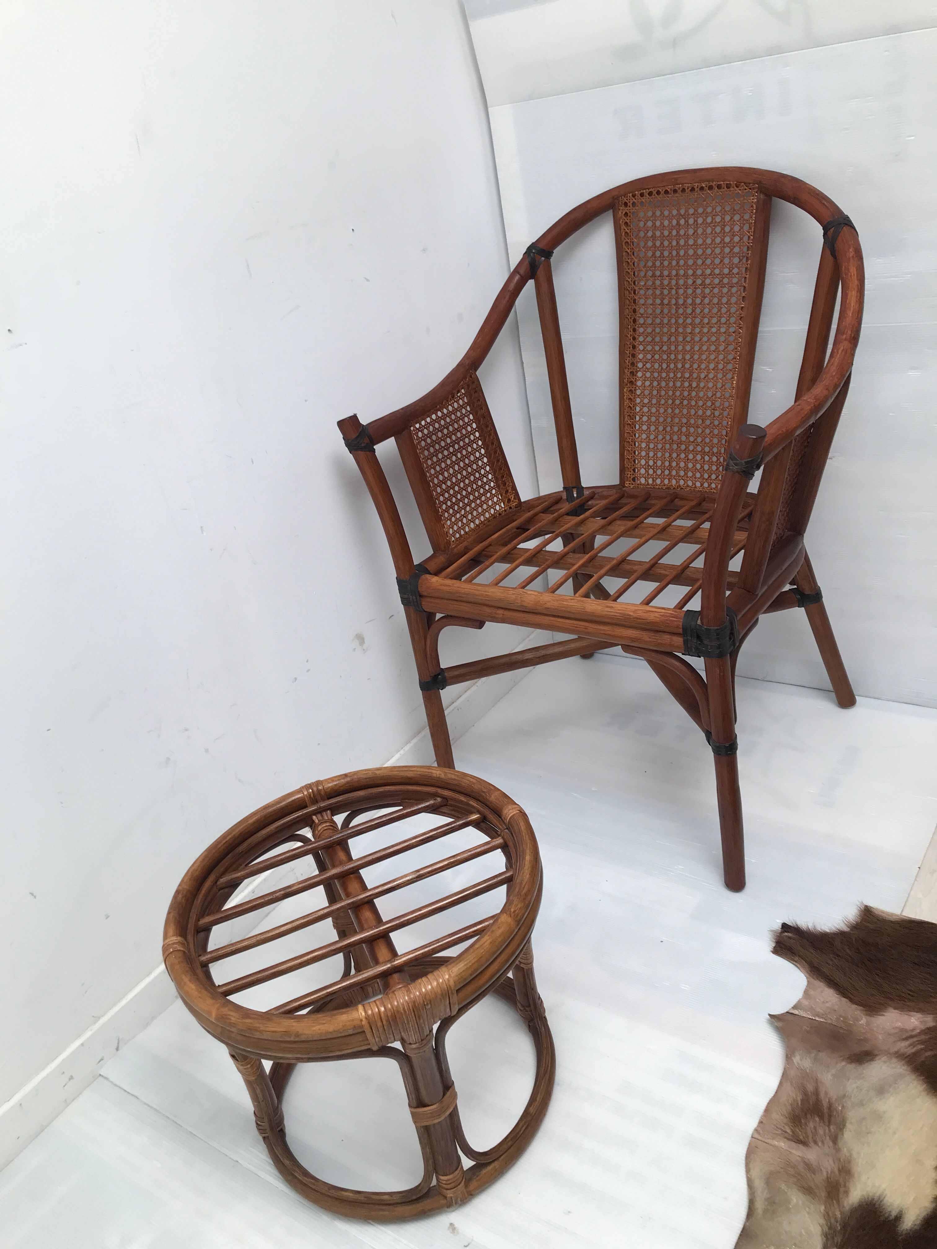 Rattan armchair with its footrest 70s