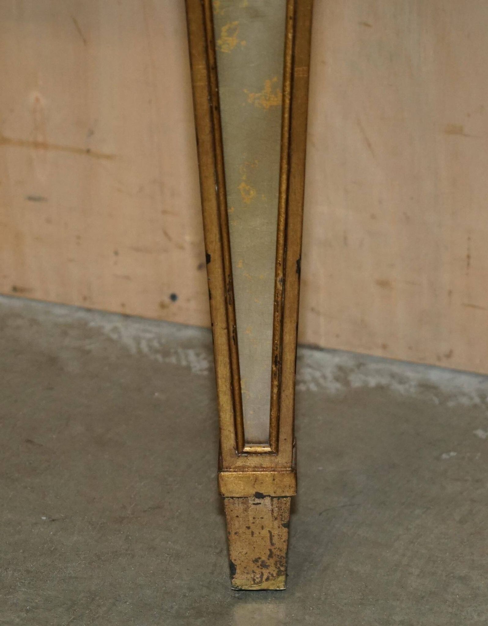 Half-moon console Eglomise Theodore Alexander with a gold finish.