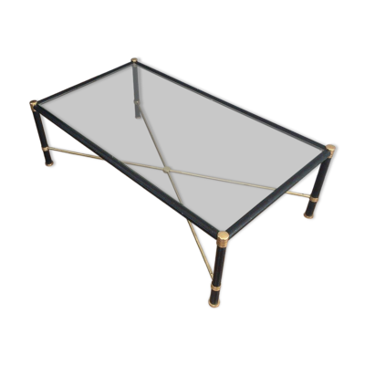 Table basse en laiton gainée de cuir noir. Dans le goût de Jacques Adnet