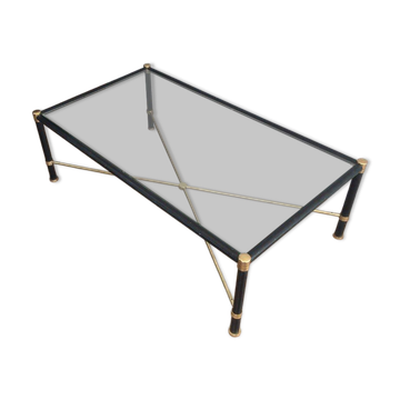 Brass coffee table upholstered in black leather. In the style of Jacques Adnet.