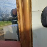 19th century mirror in wood and gilded stucco "scallop shell"