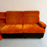 Modular vintage orange corner sofa, 1970s pop design.